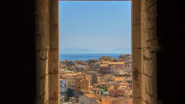 view of concrete buildings from window during daytime